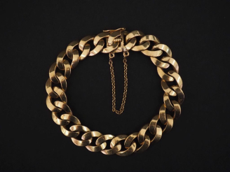 Vente aux enchères Bracelet souple en or jaune 750, maille gourmette.  Chainette de sécur