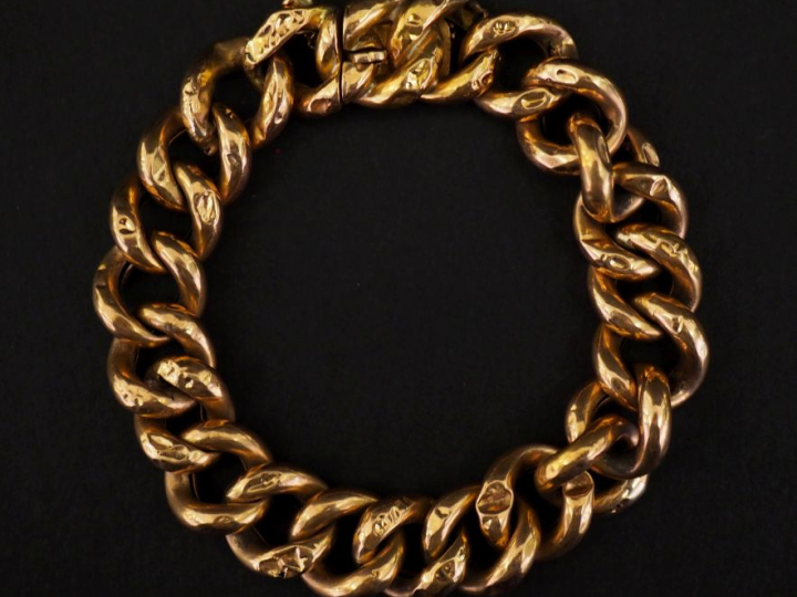 Bracelet souple en or jaune 750, maille gourmette.  Chainette de sécur