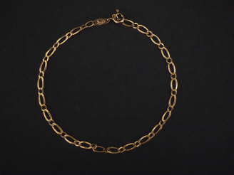 Vente aux enchères Bracelet souple en or jaune 750, maille fantaisie. Long. 21,5 cm Poids