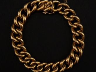 Vente aux enchères Bracelet souple en or jaune 750, maille gourmette.  Chainette de sécur
