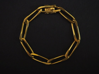 Vente aux enchères Bracelet gourmette en or jaune 750, maillons ovales.  Long. 18,5 cm Po