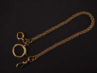 Vente aux enchères Petite giletière en or jaune 750, maille ronde tressée.  Long. 17,3 cm