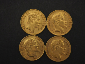 Vente aux enchères Quatre pièces de 20 Francs or, 1864-A, 1865-A, 1867-A et 1869-A.  FRAI