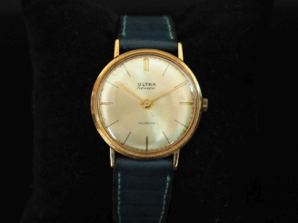 Vente aux enchères ULTRA, Flatmaster Montre bracelet, boitier en or jaune 750.  Cadran ro