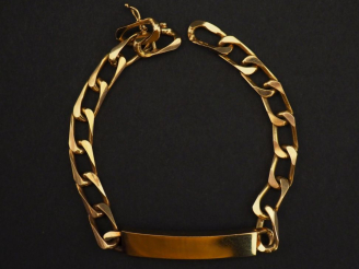 Vente aux enchères Bracelet gourmette en or jaune 750.  Long. 19 cm Poids. 20,17 g   
