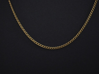 Vente aux enchères Chaine en or jaune 750, maille gourmette.  Long. 63 cm Poids. 6,70 g (