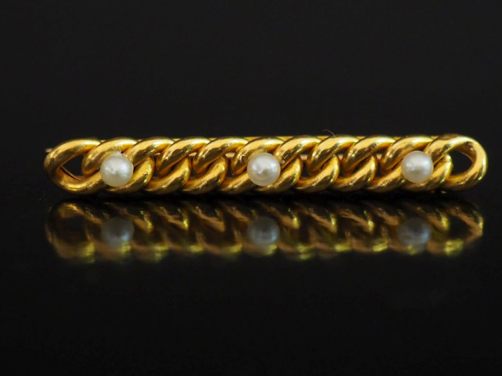 Broche barrette en or jaune 750, maille gourmette agrémentée de trois 