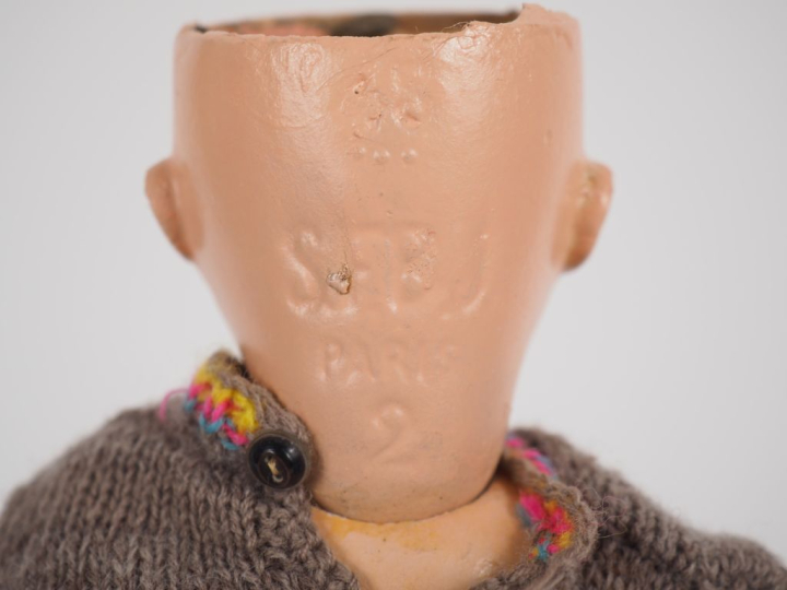 Poupée type Bleuette du début des années 30 tête carton bouche ouverte