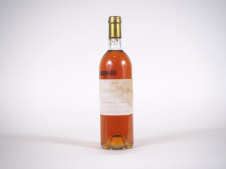 Vente aux enchères 1 BOUTEILLE CHÂTEAU CLIMENS 1er CC SAUTERNES - 1982 - BG/ET 