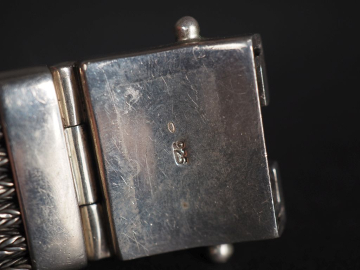 Bracelet en argent, à 14 rangs de maille tressée  signé Band of Angels