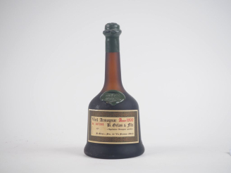 Vente aux enchères 1 BOUTEILLE VIEIL ARMAGNAC B.GÉLAS ET FILS - 1900 - CAPS ABIMÉE 