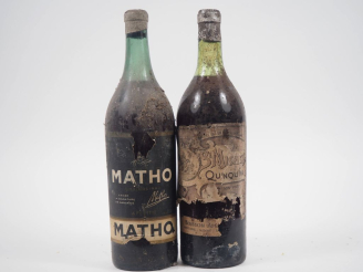 Vente aux enchères 2 VIEILLES BOUTEILLES QUINQUINA  : 1 ST MICHEL EA/BS - 1 MATHO EA/BS