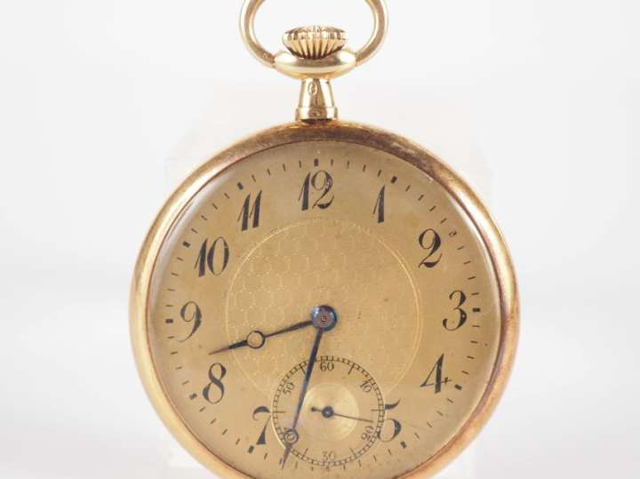 Montre de gousset en or jaune 750.  Cadran à chiffres arabes pour les 