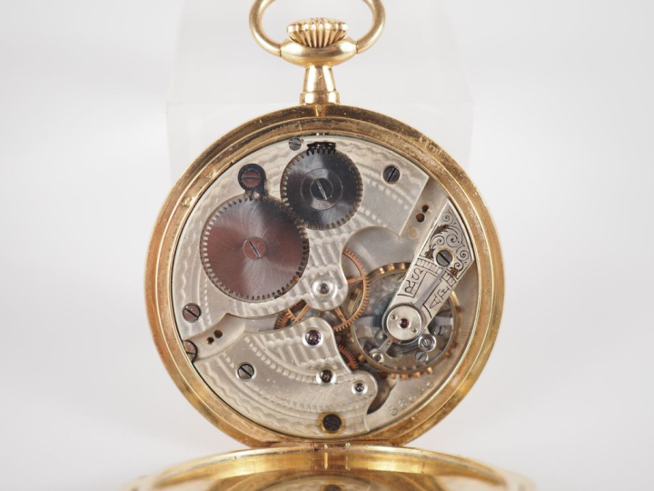 Montre de gousset en or jaune 750.  Cadran à chiffres arabes pour les 