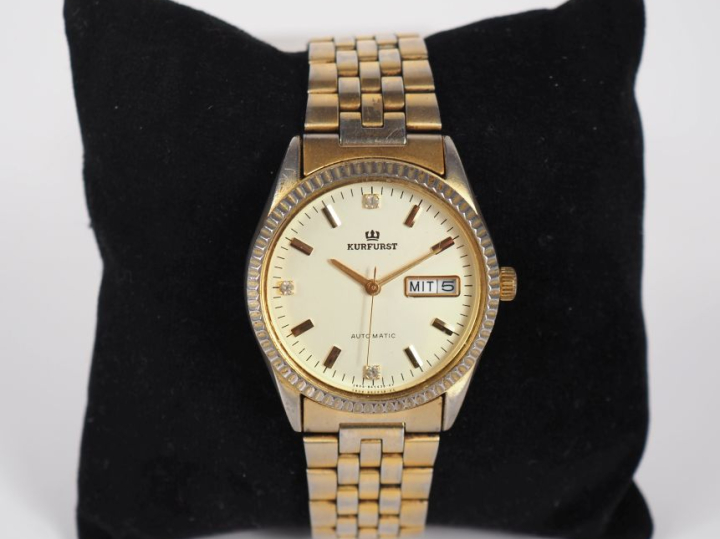 KURFURST, Automatic Montre bracelet en métal doré.  Cadran rond à inde