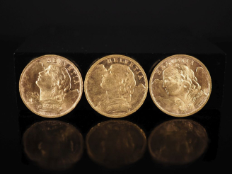 Vente aux enchères Trois pièces de 20 Francs, Suisse, 1915, 1935 et 1947. FRAIS ACHETEURS