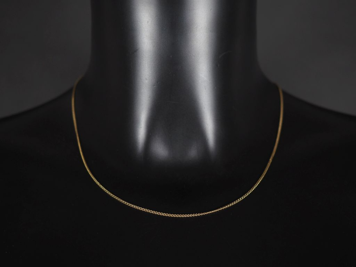 Chaine en or jaune 750, maille gourmette.  Poids. 2,47 g  (accidentée)