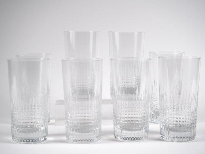 BACCARAT.  8 verres à long drink en cristal, décor de cannelures. Sign