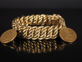 Vente aux enchères Bracelet souple en or jaune 750, maille américaine, agrémenté de deux 