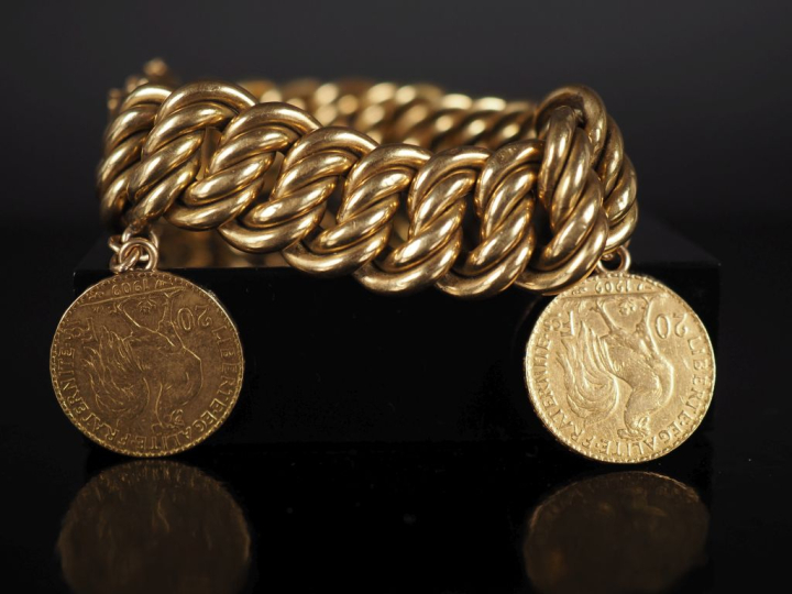 Bracelet souple en or jaune 750, maille américaine, agrémenté de deux 