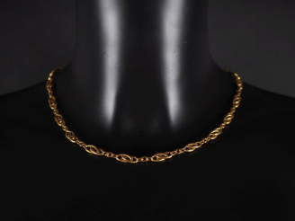 Vente aux enchères Collier souple en or jaune 750, maille entrelacée et ajourée.  Long. 4