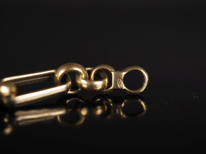 Bracelet articulé deux tons d'or 750, composé de quatre maillons jaser
