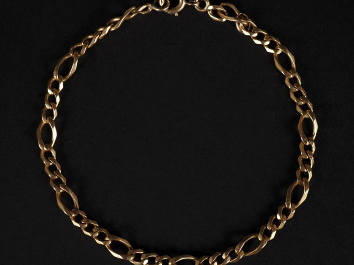 Bracelet souple en or jaune 750, maille figaro. Long. 21 cm Poids. 9,6