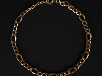 Vente aux enchères Bracelet souple en or jaune 750, maille figaro. Long. 21 cm Poids. 9,6