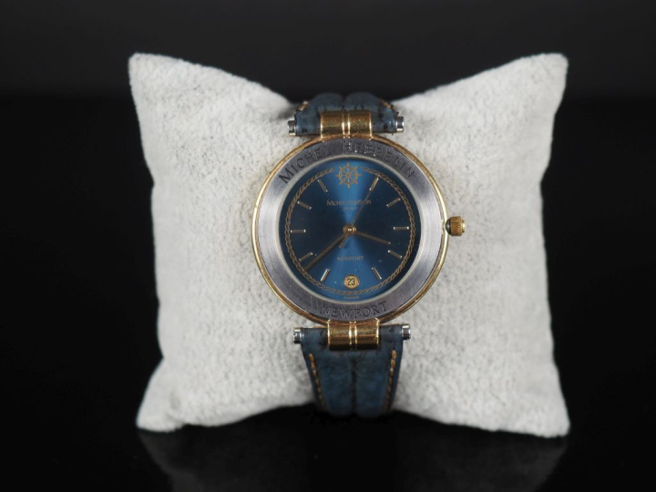 MICHEL HERBELIN, Newport Montre bracelet en métal.  Cadran rond à fond