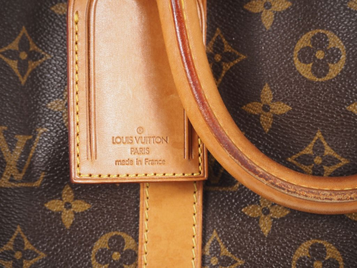 Louis VUITTON, Keepall 45 Sac en toile enduite monogrammée et cuir nat