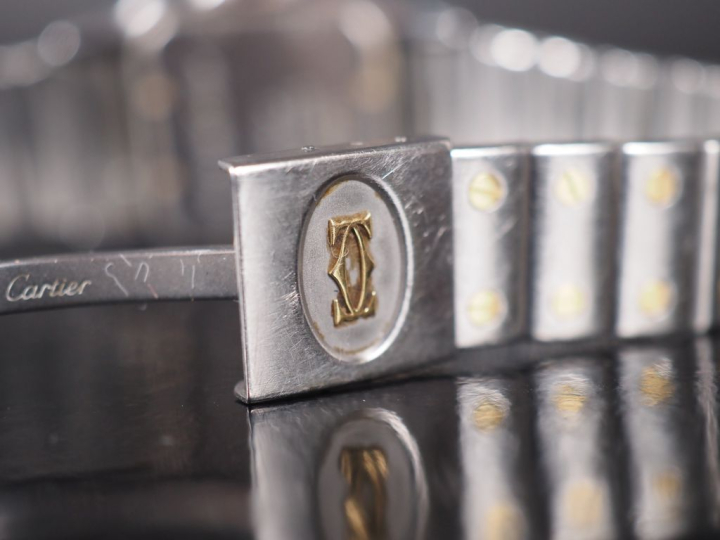 CARTIER , Santos Ref. 187 901 Montre bracelet en acier et or jaune 750