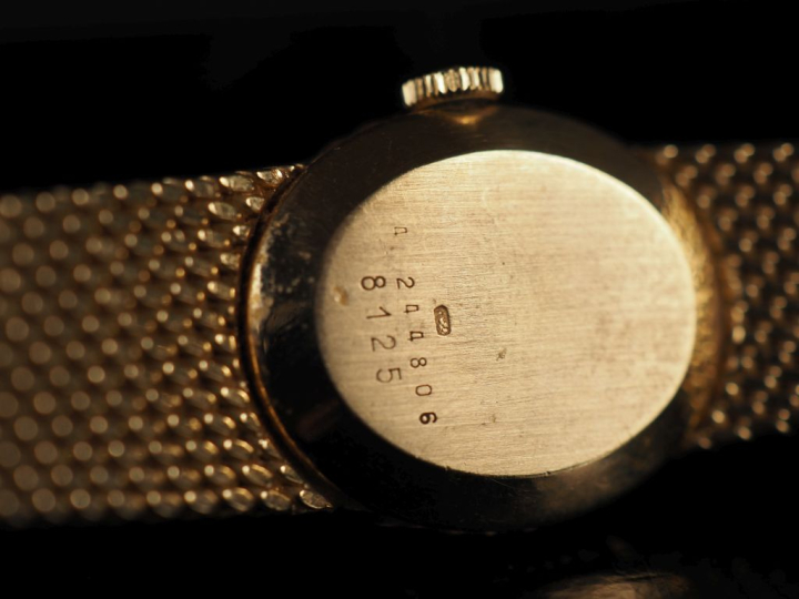 BULOVA Montre bracelet de dame, boitier et bracelet en or jaune 750.  