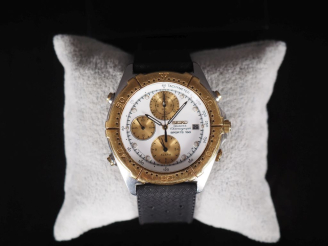 Vente aux enchères SEIKO, Sports 150 Chronograph Montre bracelet en acier et or jaune 750