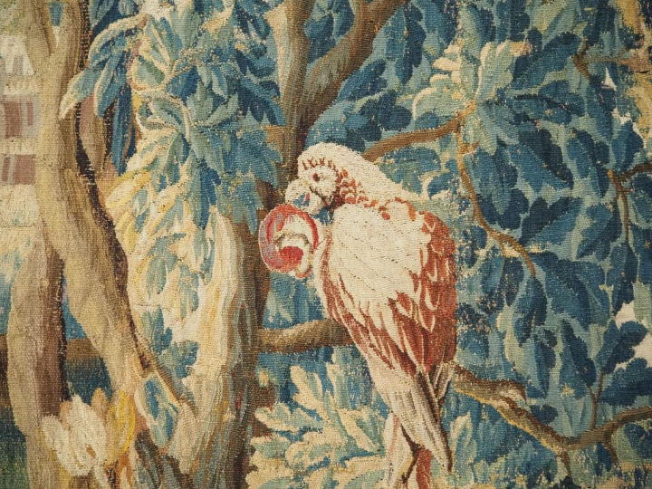 Tapisserie "Verdure" XVIIIème, à décor de personnages et de haras. Dim