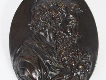 Plaque XIXème en bronze à patine brune représentant un homme à l'antiq