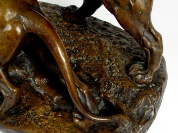 C. MASSON. "Lion et lionne". Sculpture en bronze patiné, signée, marqu