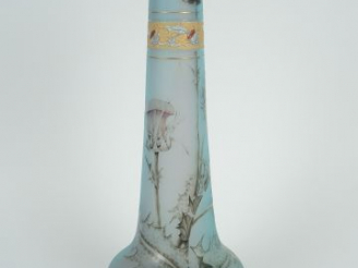 Vente aux enchères DAUM. Grand vase à décor gravé en camée à l'acide et émaillé de chardo