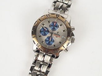 Vente aux enchères FESTINA. Montre d'homme. 2 bracelets. Certificat. Dans son coffret d'o