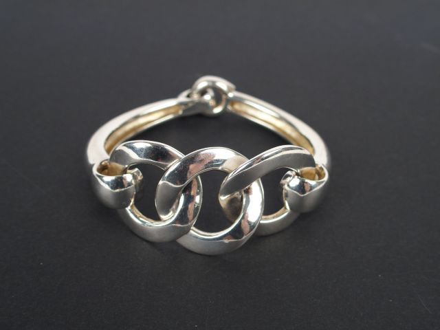 HERMES. Bracelet jonc en argent, 3 anneaux entremêlés. Dans son écrin 