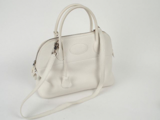 Vente aux enchères HERMES. Sac Bolide en torillon clémence blanc. Cadenas gainé. 2006. Di