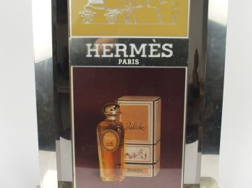 HERMES. Important présentoir publicitaire pour Calèche d’Hermès (année