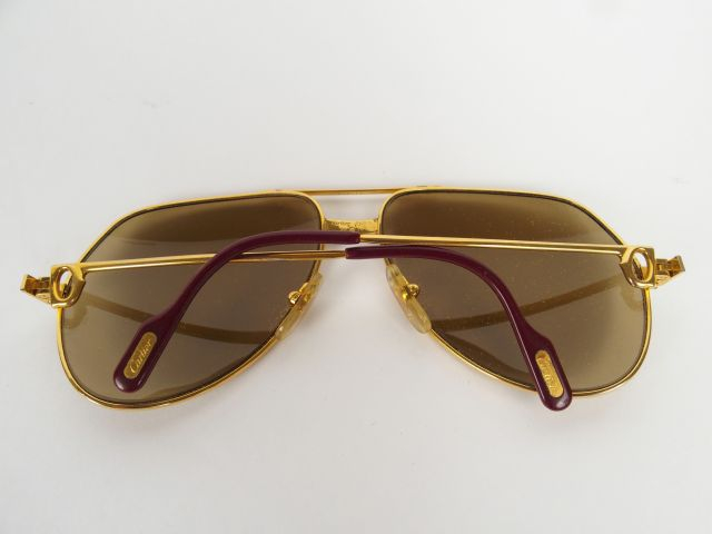 CARTIER. Paire de lunettes Santos, années 80.