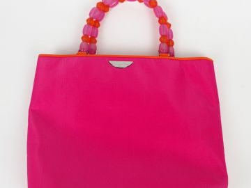 Christian DIOR. Sac en toile fluo rose et orange, poignées en perles