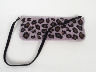 Vente aux enchères Sac du soir en perles imitation léopard.