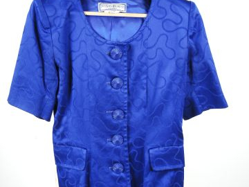 Yves SAINT LAURENT. Veste de femme à manche courte