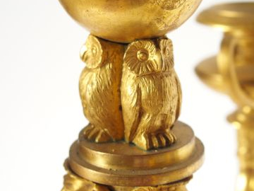 Paire de candélabres Empire, en bronze doré, à décor de masques, de ch