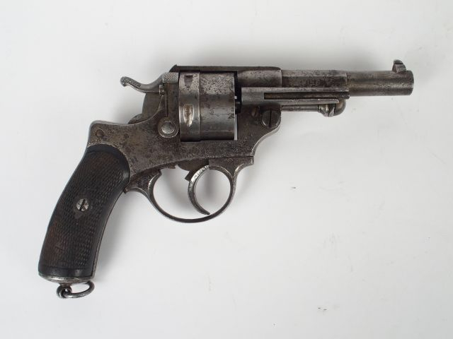 Révolver réglementaire modèle 1873, bon état fonctionnel, peau d’orang