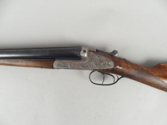 Vente aux enchères 73- Fusil juxtaposé Allemand fabrication SIMSON à Suhl à contre-platin