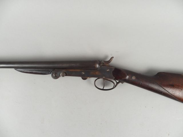 76- Petit Fusil juxtaposé pliant dit « de braconnier ». Calibre 24. Sy