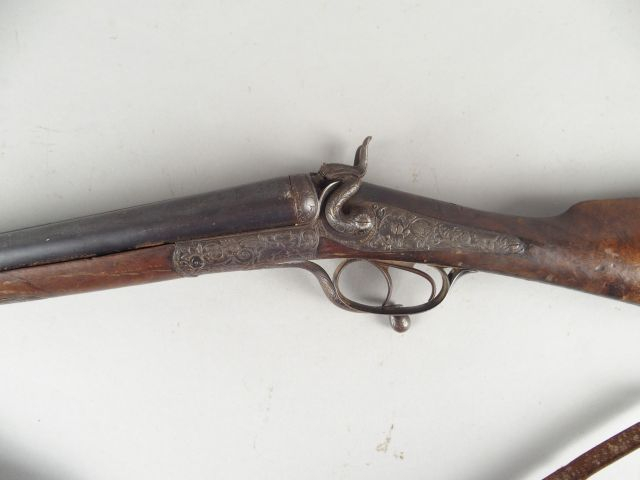 168- Fusil de chasse juxtaposé à chien calibre 16/65, ouverture sous l